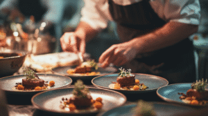 chef plating multiple dishes